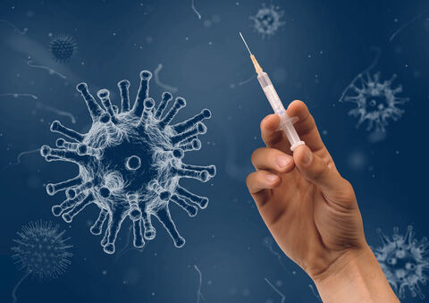 Coronavirus und Hand mit Spritze (Bild: Pixabay / Wilfried Pohnke)